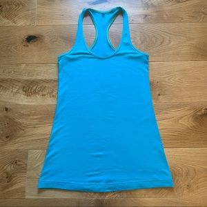 Lululemon racerback athletic tank top. Size 6. Bright blue.